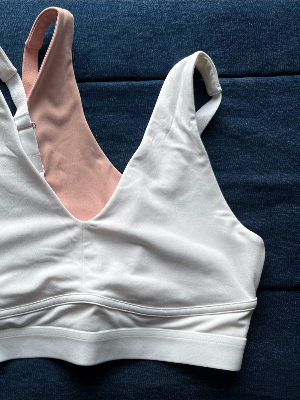 Fabletics White and Blush Pink V‑Neck Sports Bras